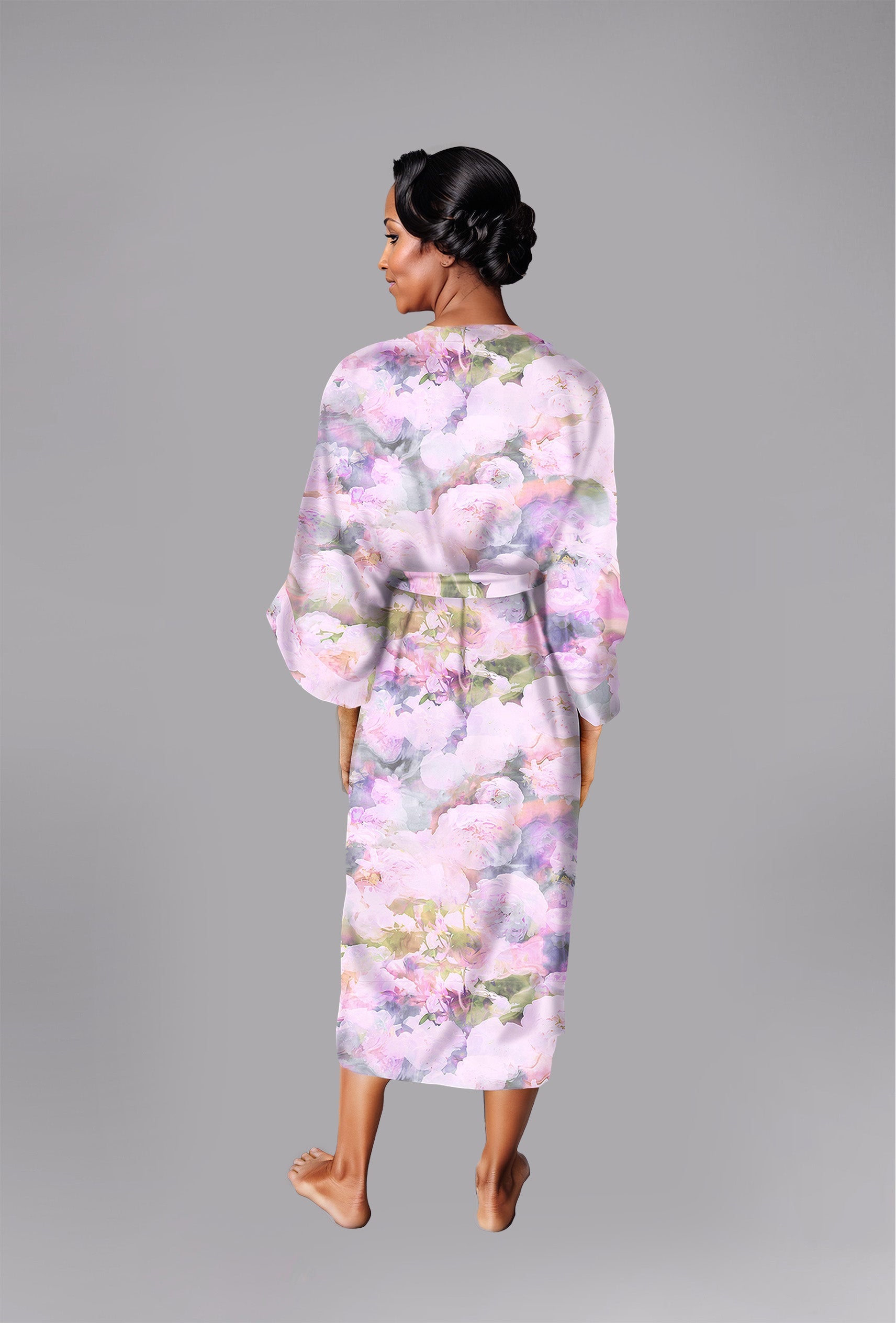 Woman wearing kimono robe in Pink Poppy back profile view