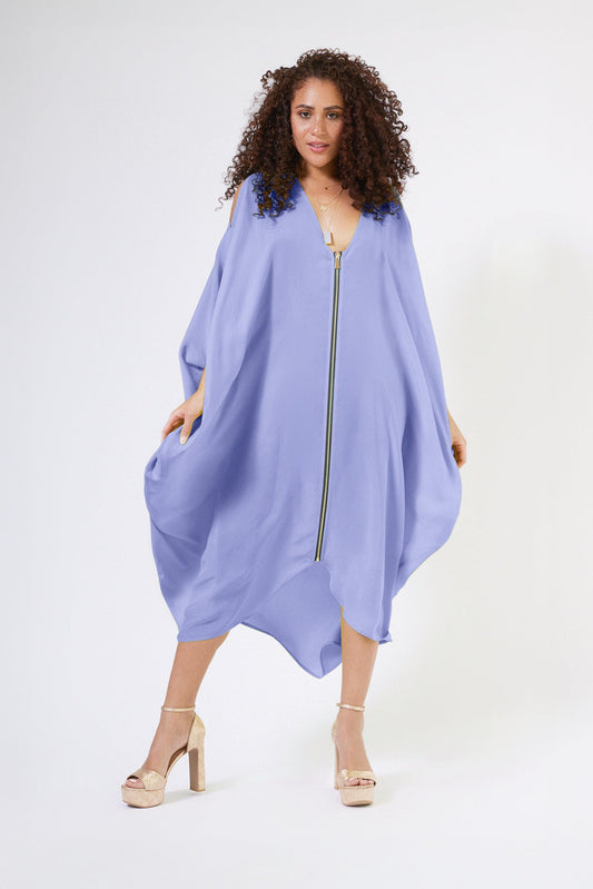 woman modelling a lavender kaftan duster with front zipper made from recycled materials