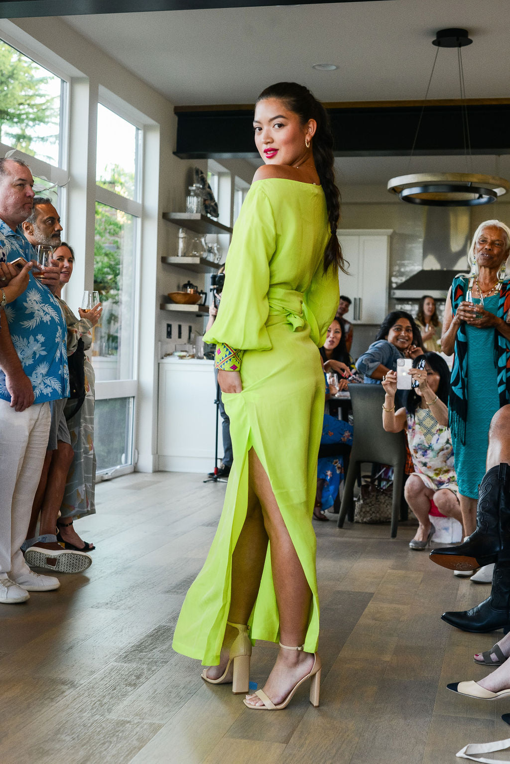 woman modelling a bright yellow kaftan duster with embroidered sleeves made from recycled materials 4