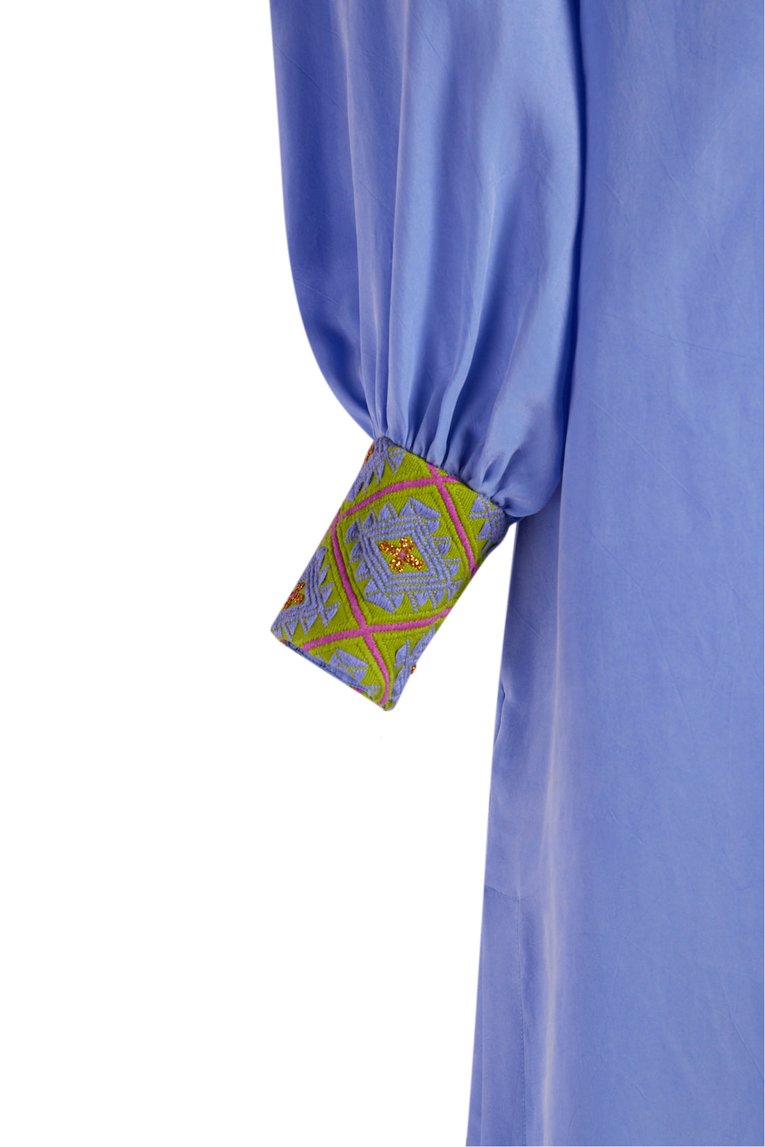 close up view of lavender kaftan duster with embroidered sleeves made from recycled materials