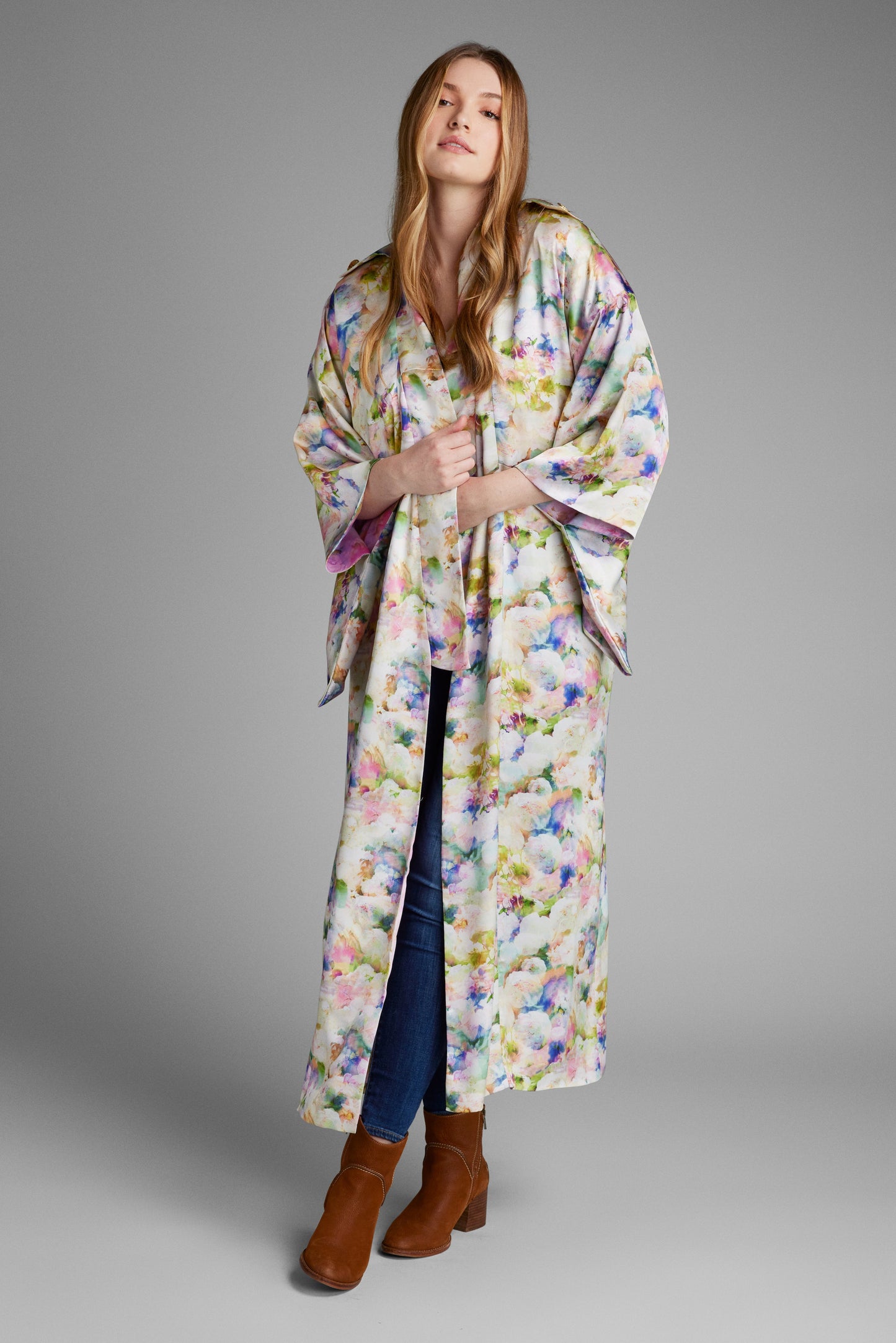 Front profile of woman wearing an all over floral printed kimono duster made from recycled textiles 4