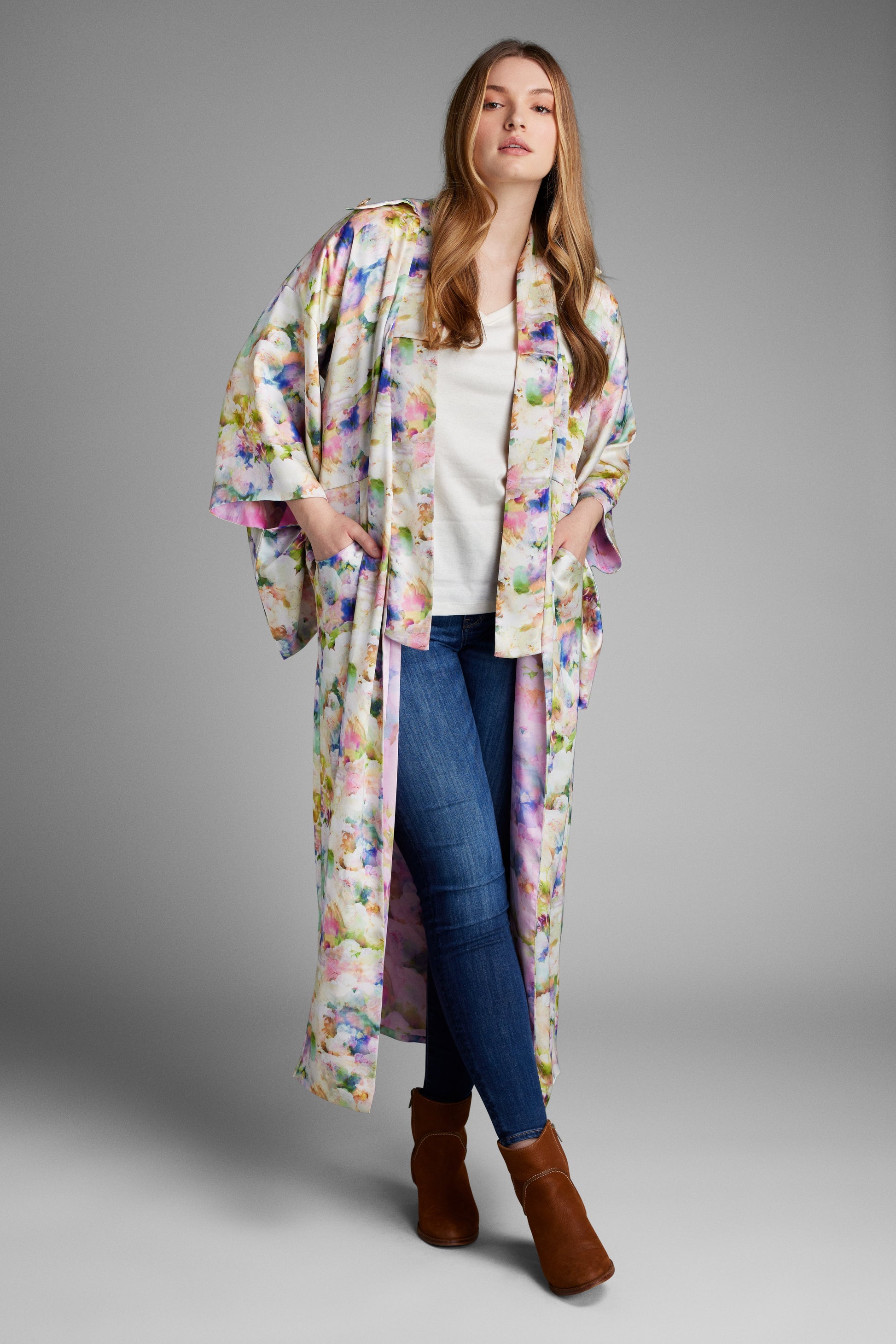 Front profile of woman wearing an all over floral printed kimono duster made from recycled textiles 5