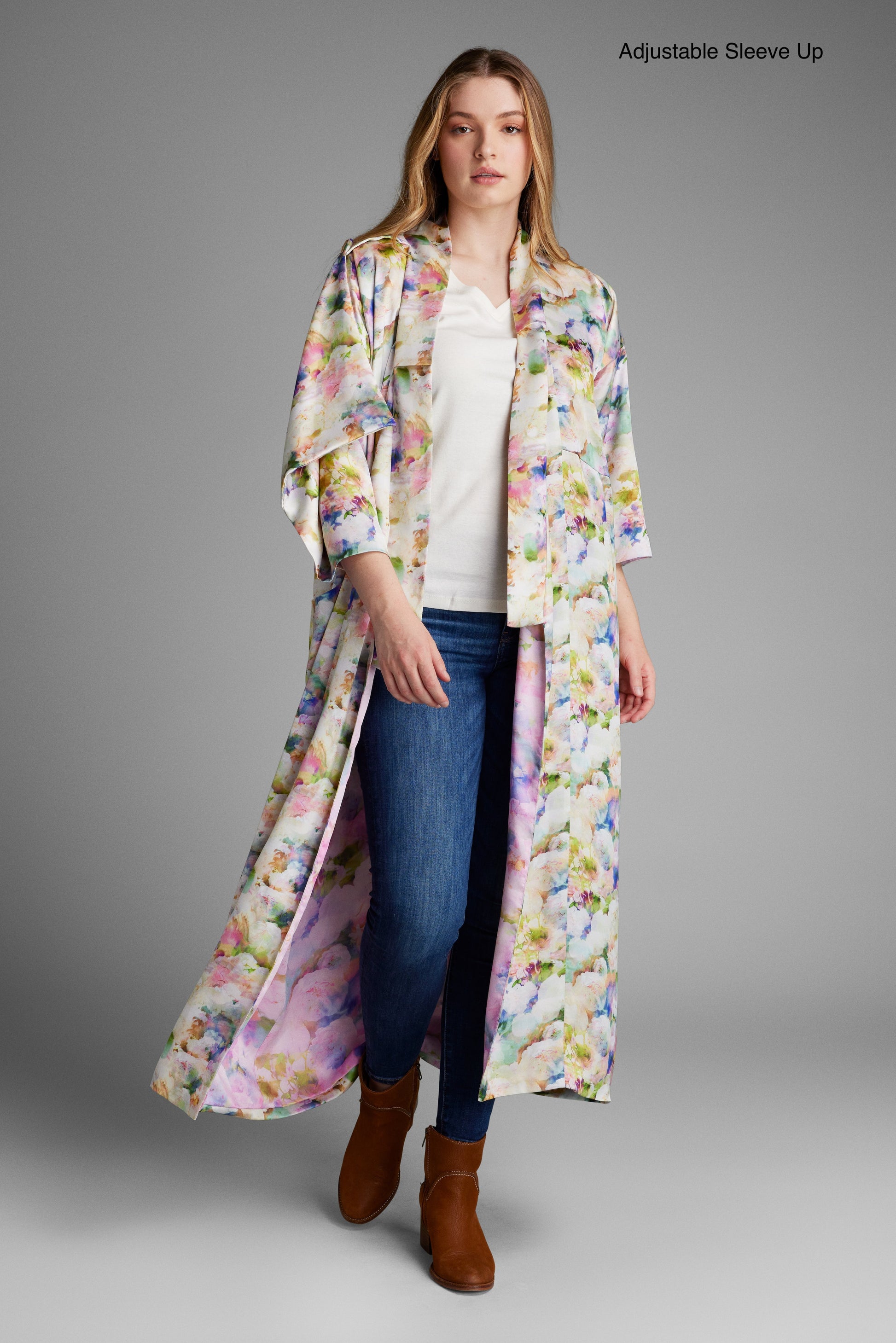 Front profile of woman wearing an all over floral printed kimono duster made from recycled textiles 6