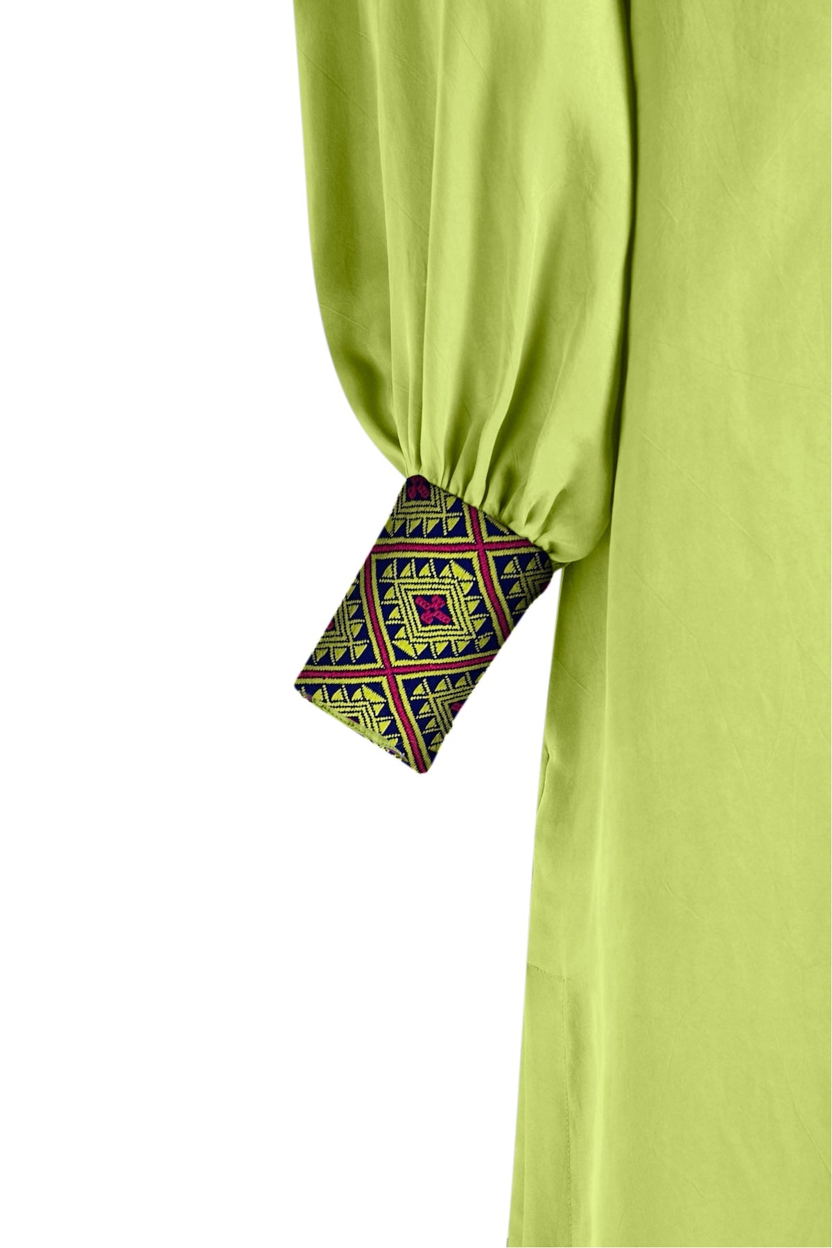 close up profile of yellow lotus kaftan duster with front zipper made from recycled textiles